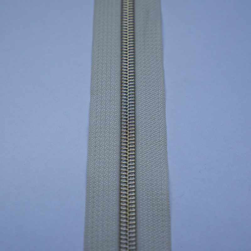 Nylon zipper with different color teeth